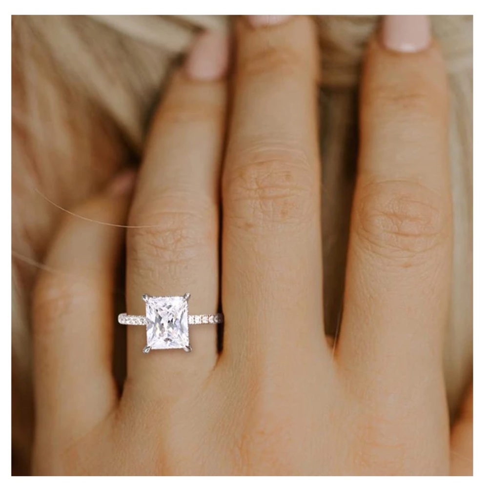 New 4 carat ring size 4
